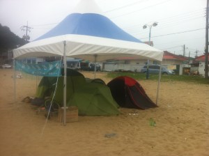 Our attempts to keep out of the 'downpour' we'd been promised.