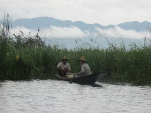 Even torrential rains can't keep the smiles off the locals faces. 